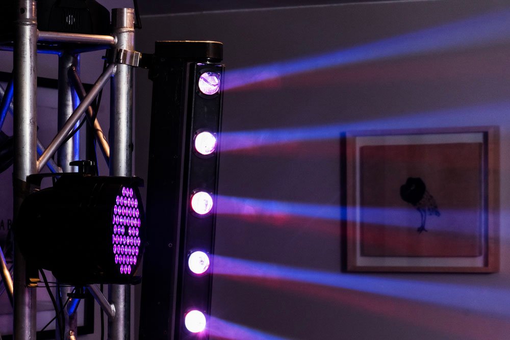Stage lighting and smoke effects at a live entertainment event