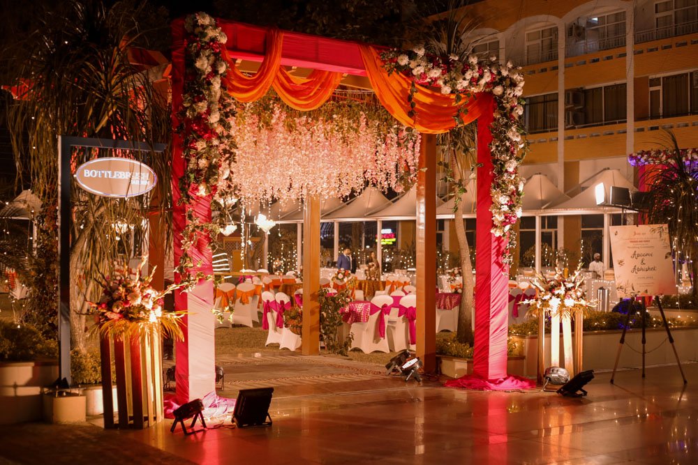 Wedding gate decorated with green eucalyptus for a River Stone ceremony